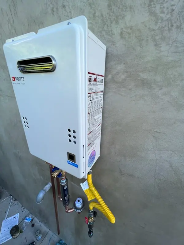 Tankless water heater installation for Northland Shopping Center homes